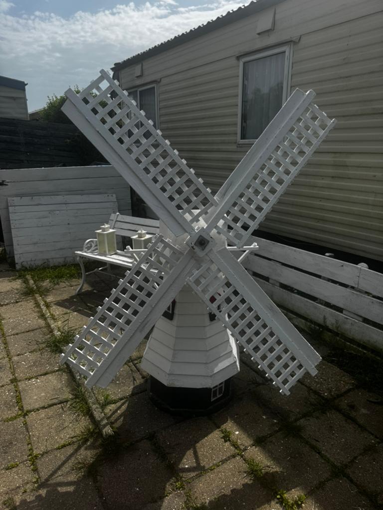 Houten tuinmolen, Ophalen, Gebruikt