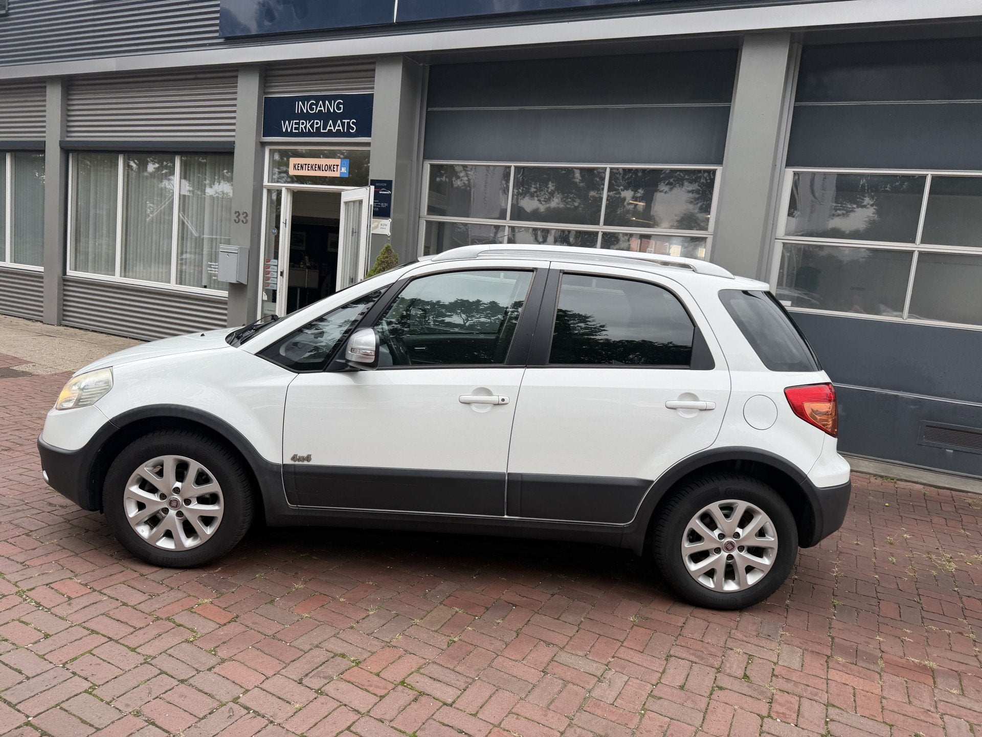 Fiat Sedici 1.6-16V Experience 4x4 | Clima | LMV | Trekhaak, Auto's, Gebruikt, Zwart, 4 cilinders, 400 kg
