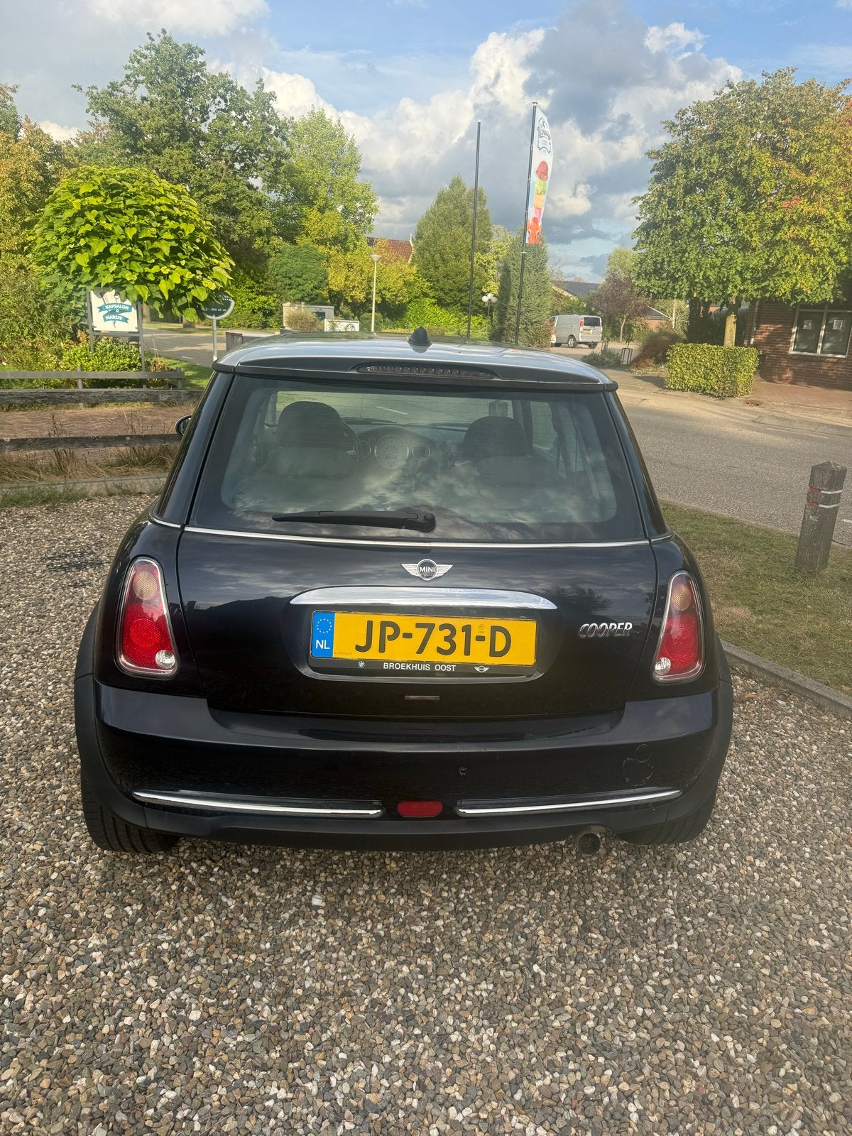 Mini 1.6 16V Cooper 2006 Zwart, Auto's, Voorwielaandrijving, 4 cilinders, 4 stoelen, Zwart