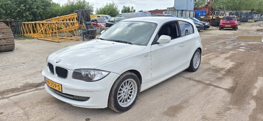 BMW 1-serie 116i, 2011, 198.880 km, Auto's, Stof, 4 cilinders, Sound system, Wit