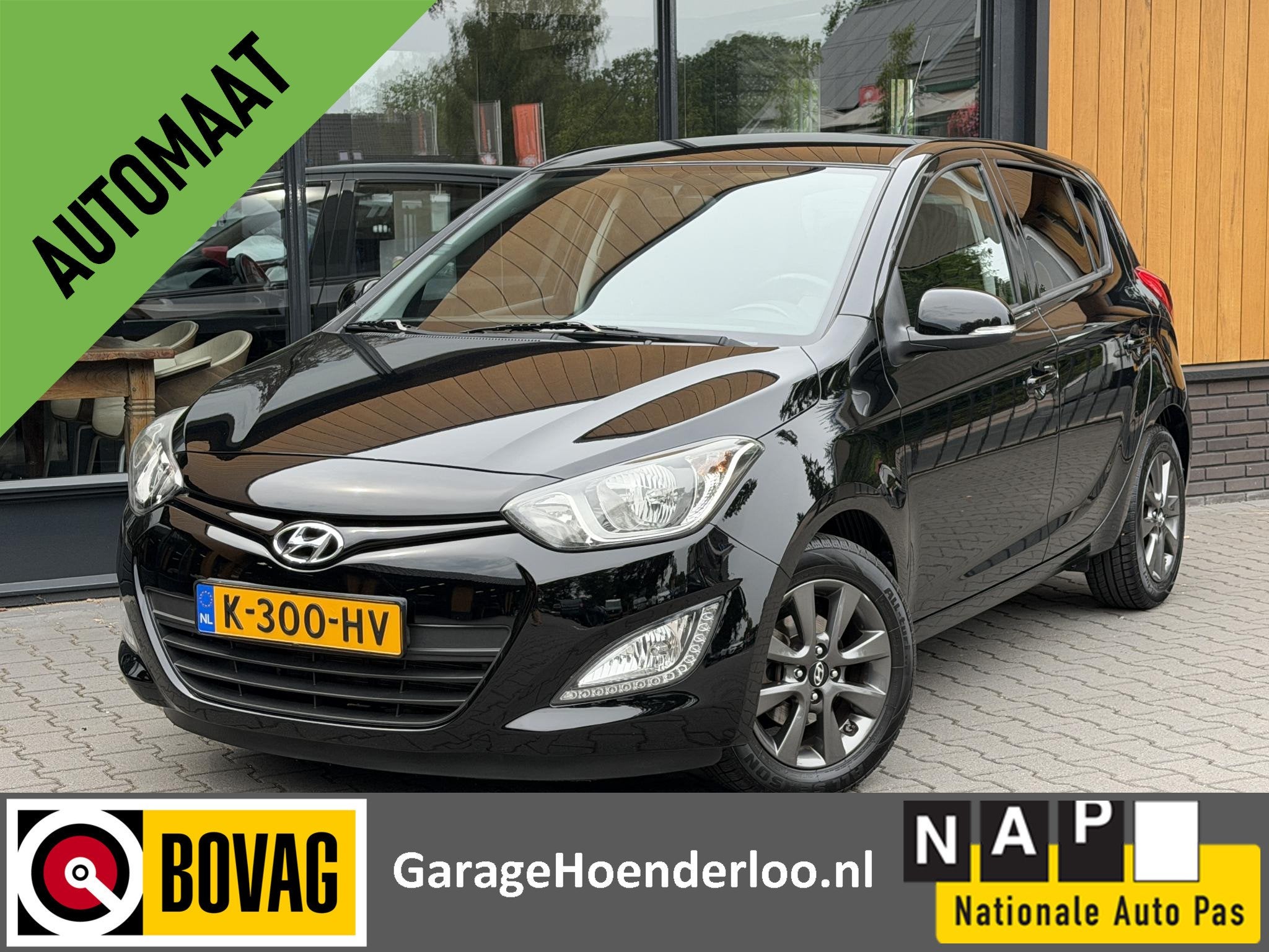 Hyundai i20 1.4i Automaat, Carkit, Cruise control. Garantie, Auto's, Euro 5, 4 cilinders, Zwart, 17 km/l