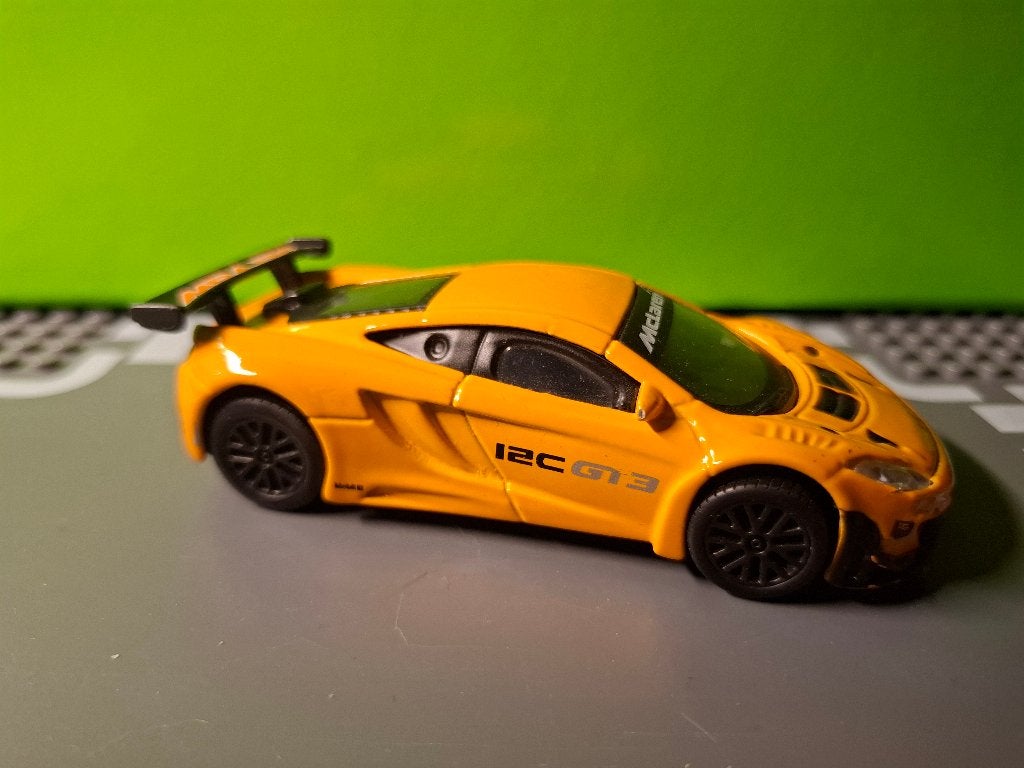 Bburago - McLaren 12C GT3 [oranje] 1/43, Ophalen of Verzenden, Gebruikt, Auto, Overige merken