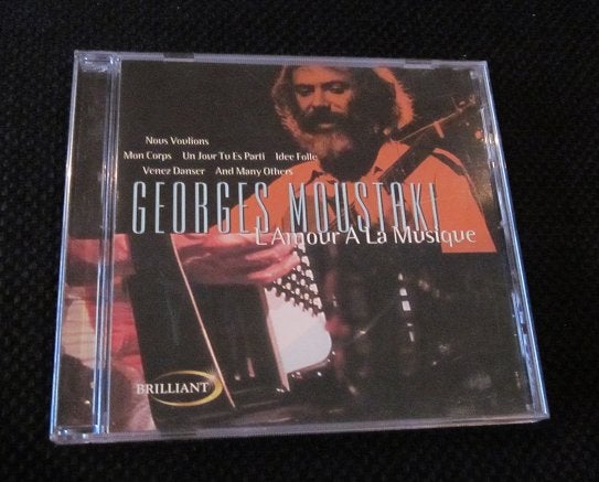 cd georges moustaki l' amour a la musique jou jour cousine &, Ophalen of Verzenden, Gebruikt, Folk, Inclusief doosje