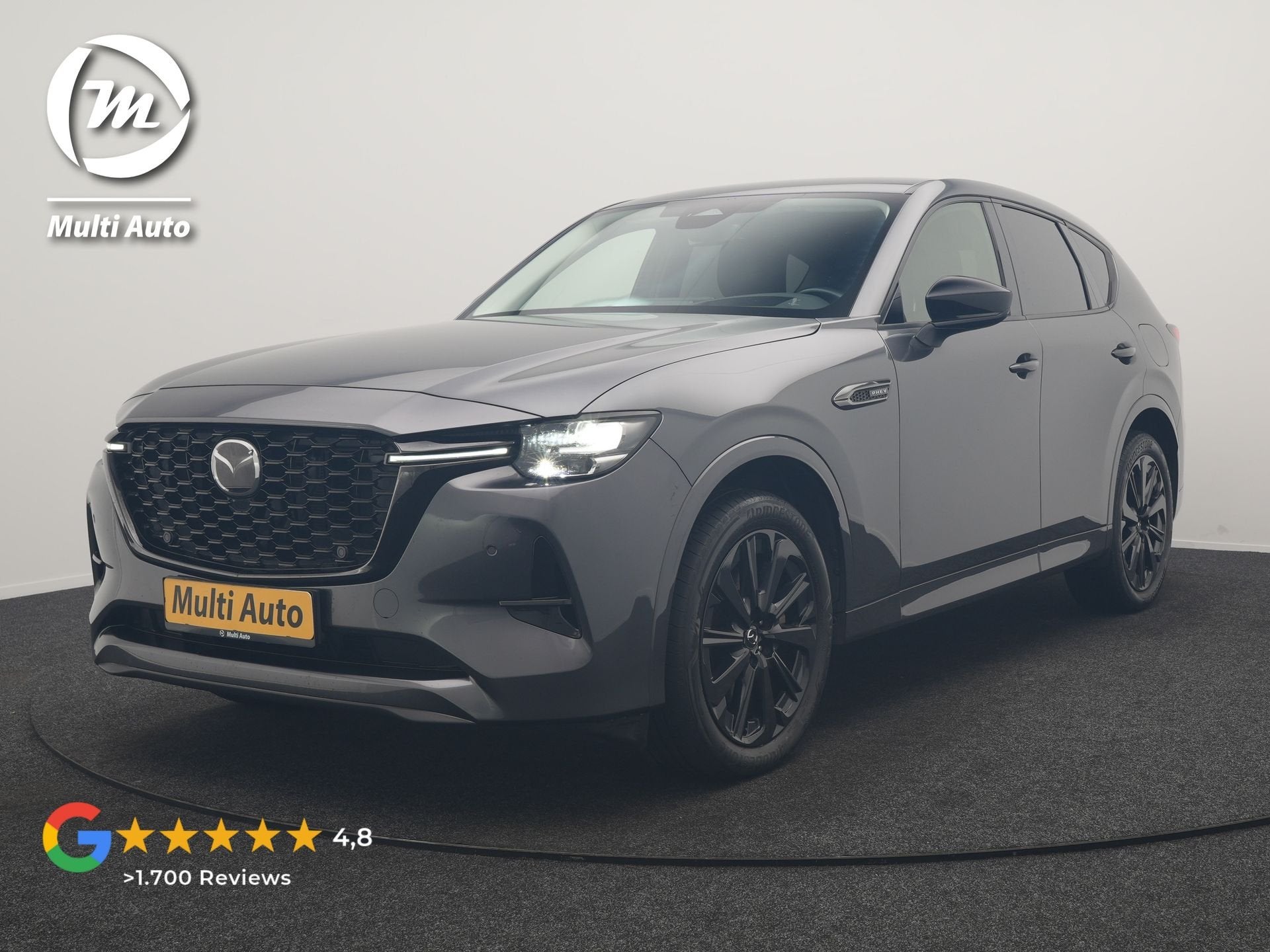 Mazda CX-60 2.5 e-SkyActiv PHEV Homura 327pk Dealer O.H. | S, Auto's, Automaat, Dealer onderhouden, Gebruikt, Zwart
