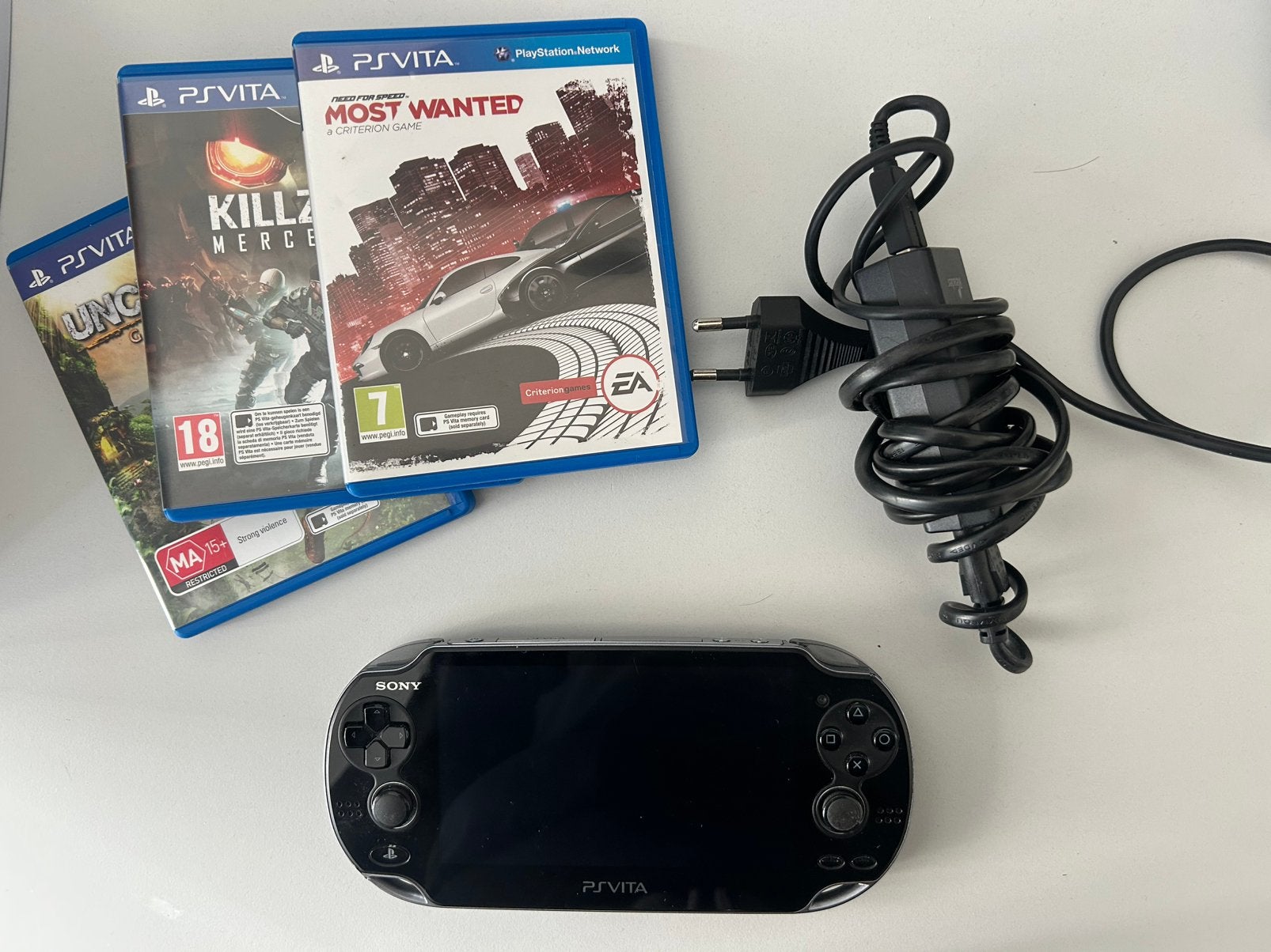 Sony PlayStation PS Vita OLED – 8GB – 3 Games – Oplader, Ophalen, Zo goed als nieuw, Zwart, Met games