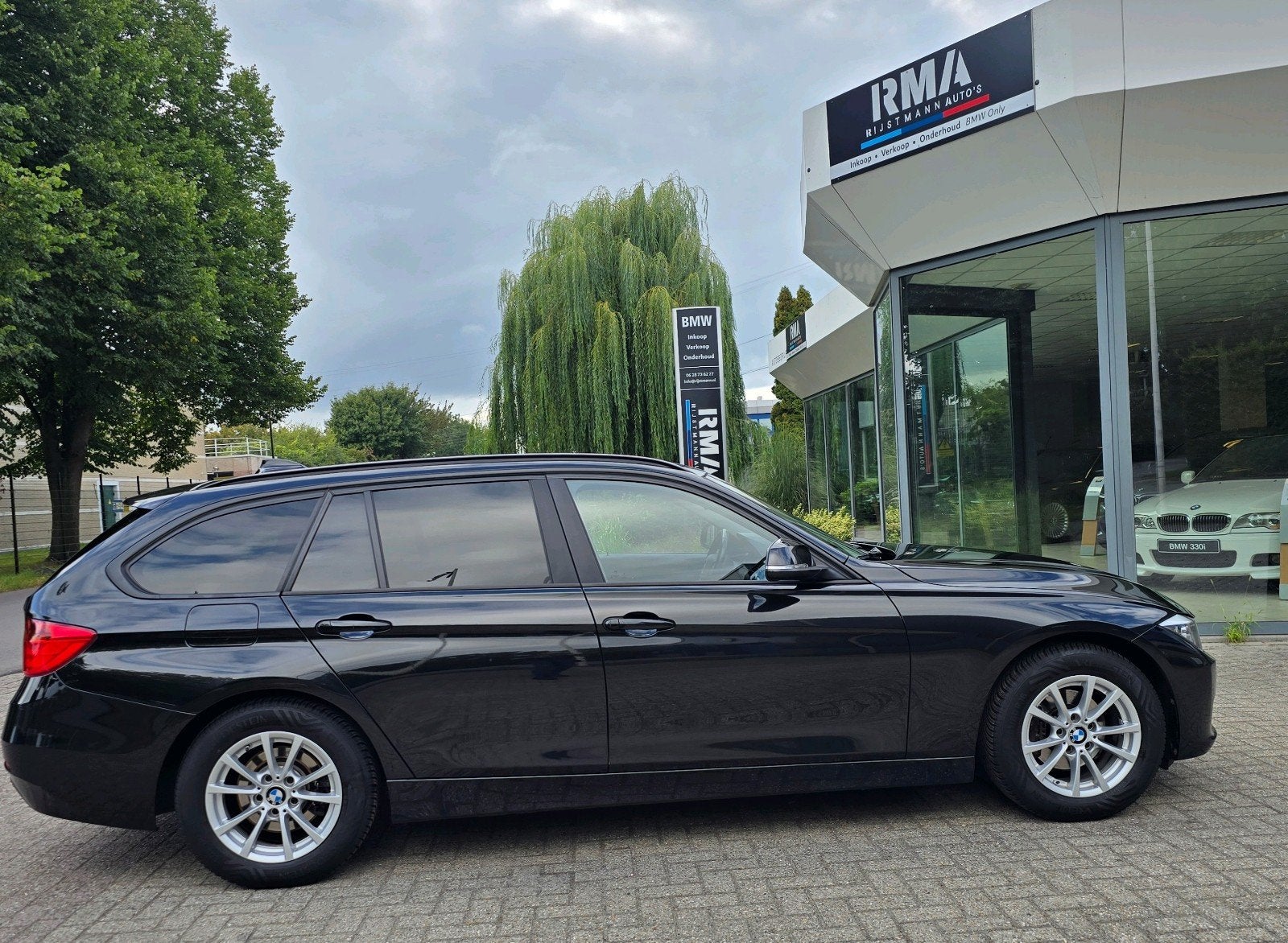 BMW 3-Serie 316i Touring 136pk 2015 Zwart Stationwagon, Auto's, BMW, Euro 5, Zwart, 4 cilinders, Zwart