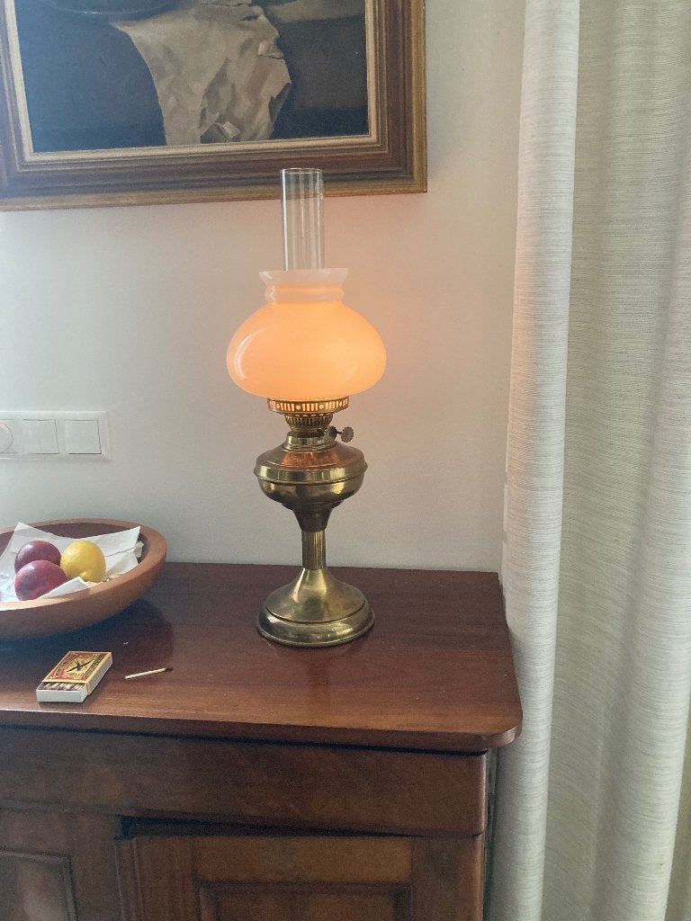 Antieke koperen olielamp, Ophalen