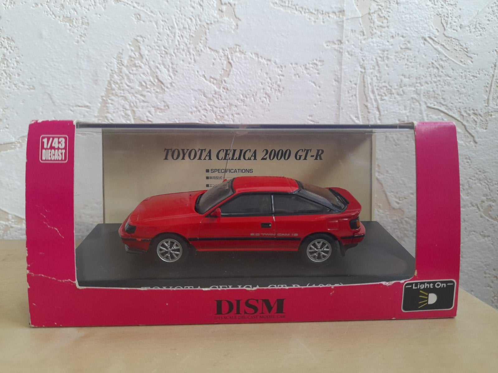 Toyota Celica Gt-r 1985 Rood Dism 1/43 (Incl Ovp), Ophalen of Verzenden, Zo goed als nieuw, Auto, Overige merken