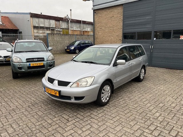 Mitsubishi Lancer Station Wagon 1.6 Inform//Top onderhouden, Auto's, Mitsubishi, Voorwielaandrijving, Stof, Gebruikt, Zwart