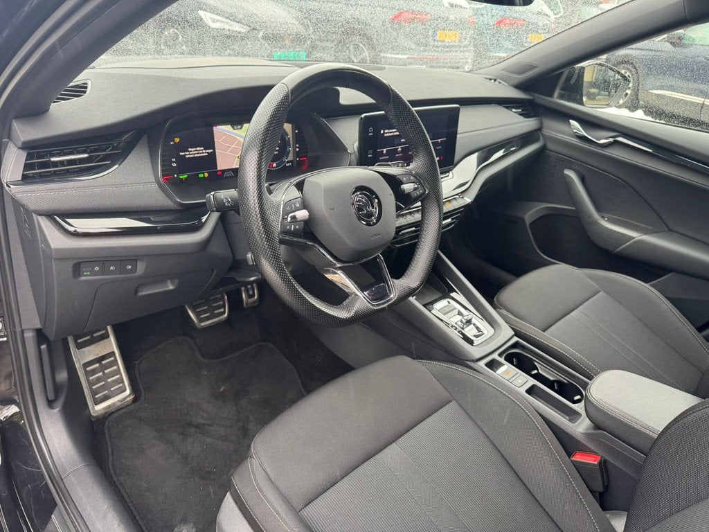 Skoda Octavia Combi 1.4 TSI iV PHEV Sportline 245pk virtual, 1556 kg, Stof, Gebruikt, 4 cilinders