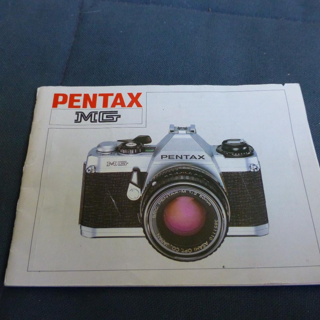 Asahi Pentax MG gebruiksaanwijzing, Audio, Tv en Foto, Fotocamera's Analoog, Ophalen of Verzenden, Zo goed als nieuw, Spiegelreflex