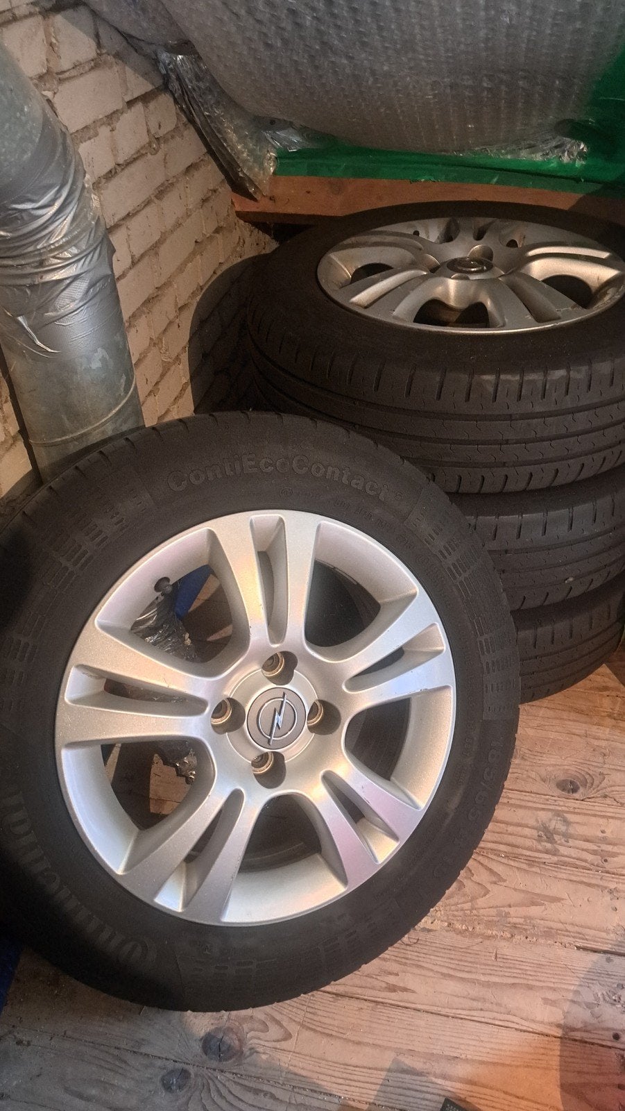 4 Opel velgen met gebruikte banden, Ophalen, Gebruikt, 15 inch, 185 mm