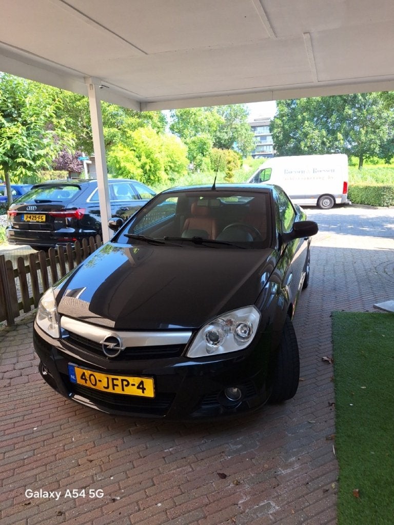 Opel Tigra 1.4 16V Twintop 2009 Zwart, Auto's, Voorwielaandrijving, Euro 5, 4 cilinders, Cabriolet