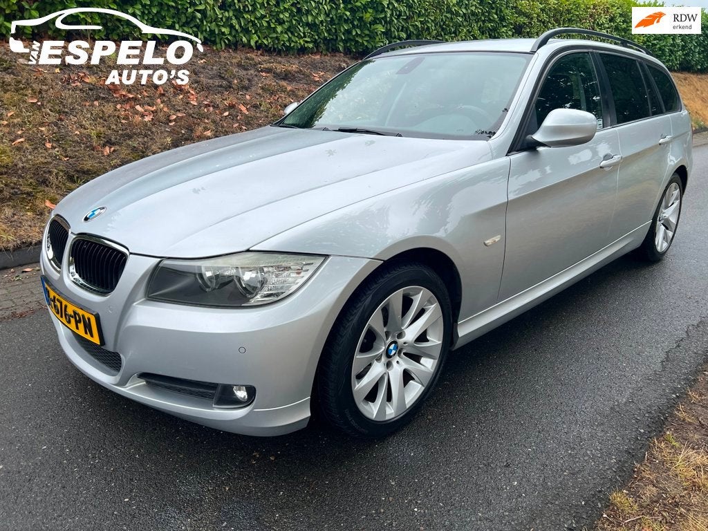 BMW 3-serie Touring 318i AUTOMAAT met oa: Trekhaak, Pdc v+a,, Auto's, BMW, Automaat, Euro 5, Zwart, 1435 kg