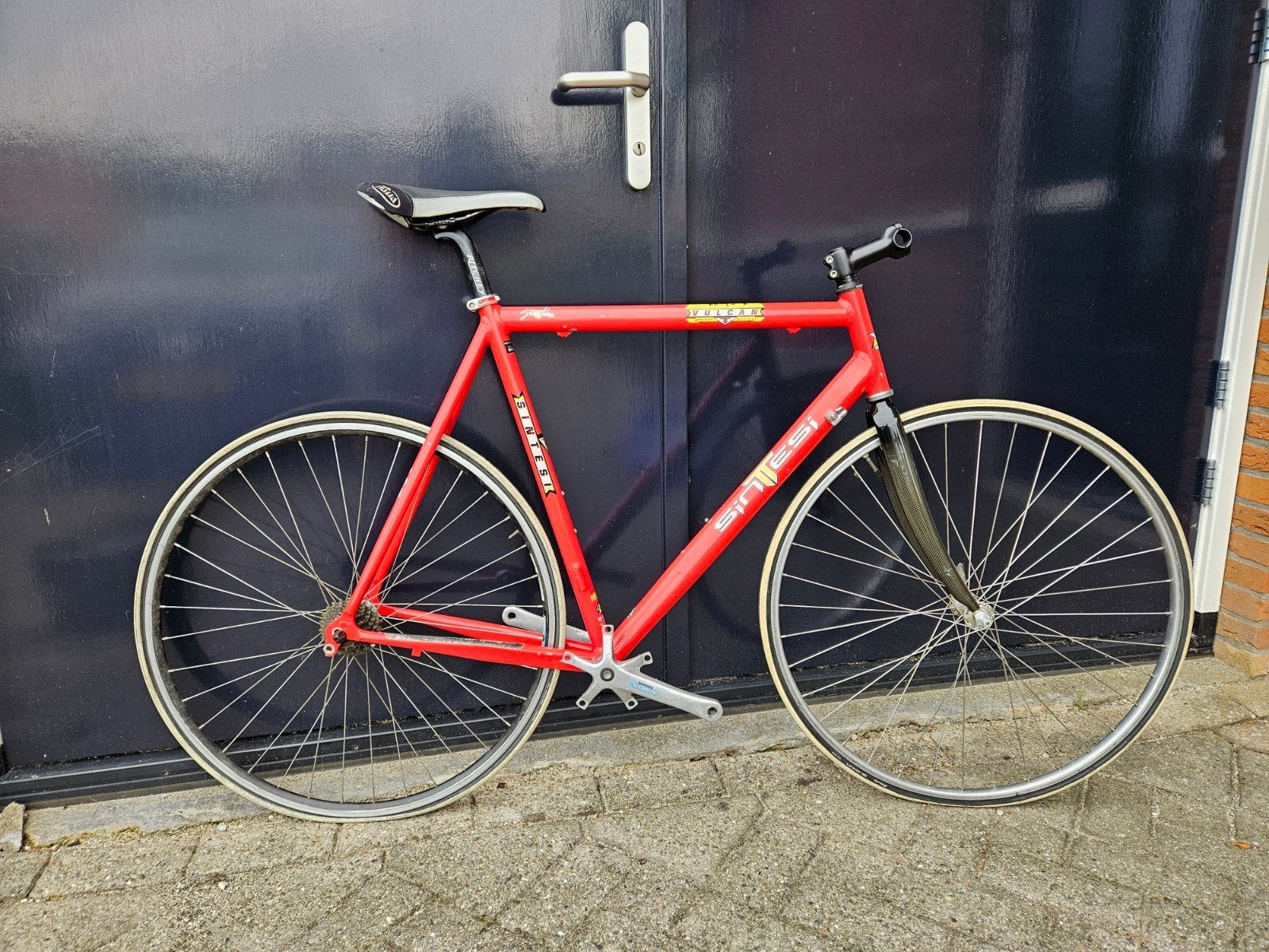 Sintesi Vulcan rood 60 cm, 28 inch, Gebruikt, Velgrem, Aluminium
