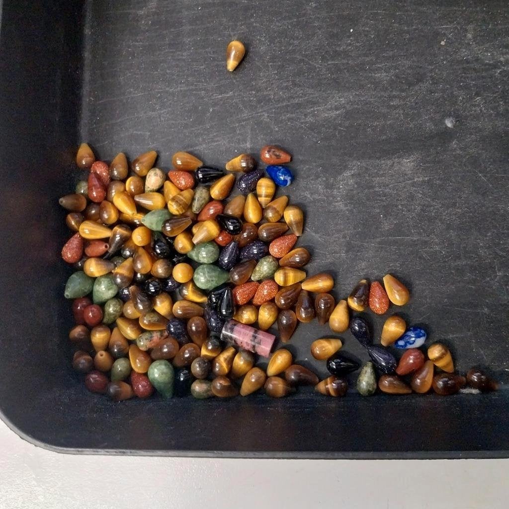 Lot met ingeboorde edelsteen pegels, Ophalen of Verzenden