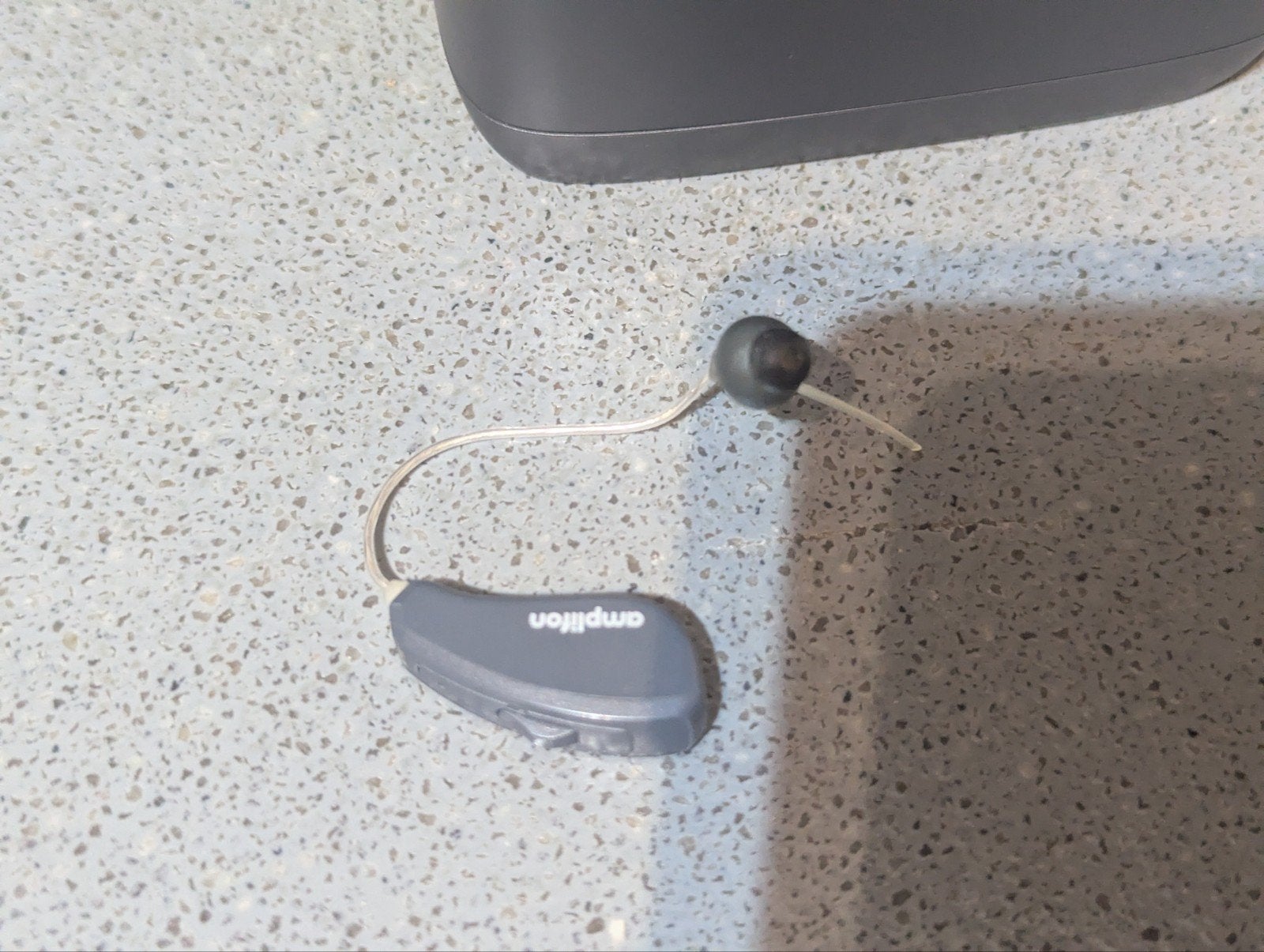 Amplifon hoortoestellen met oplader, Ophalen
