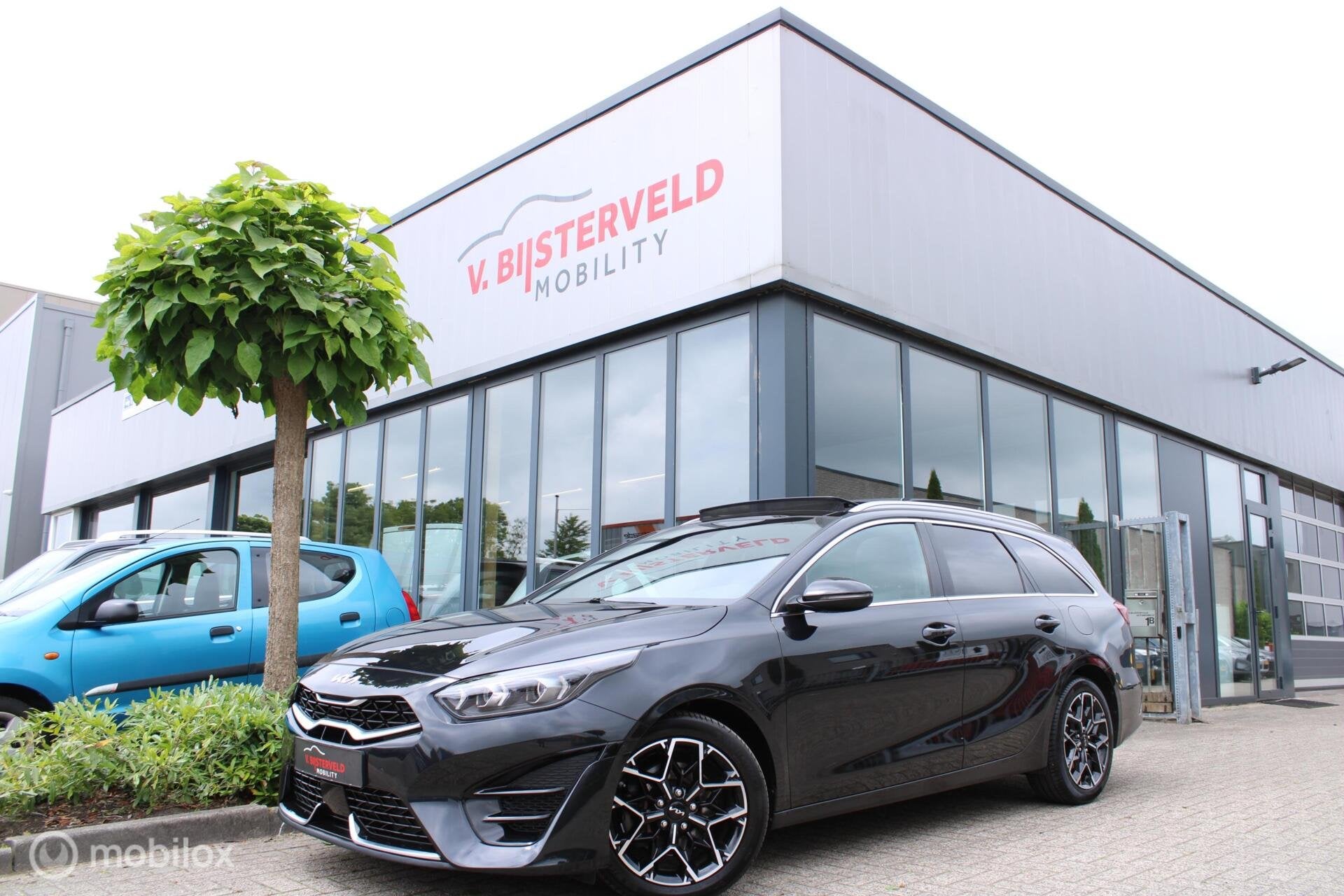 Kia Ceed Sportswagon 1.5 T-GDi GT-Line Pano|Carplay|, Gebruikt, 4 cilinders, Leder en Stof, Zwart