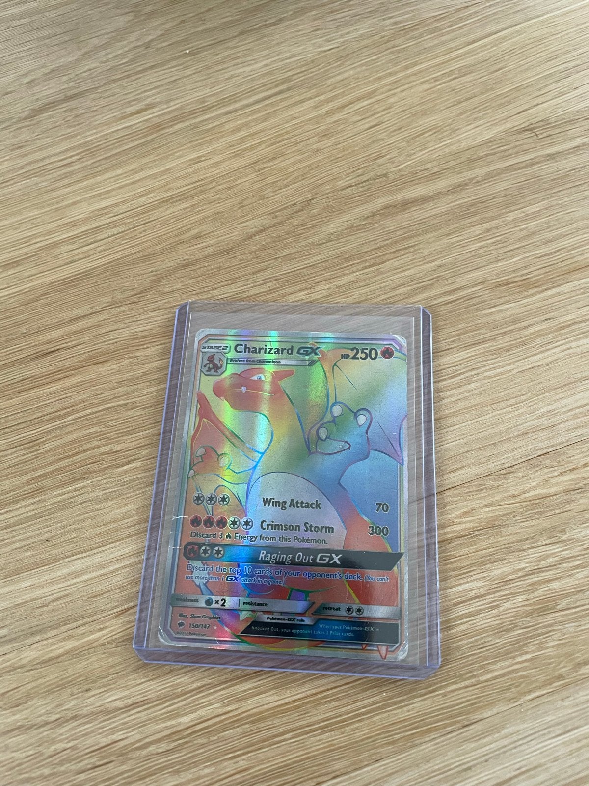 Charizard GX Rainbow Rare Pokémon kaart (150/147), Ophalen of Verzenden, Zo goed als nieuw, Losse kaart, Foil