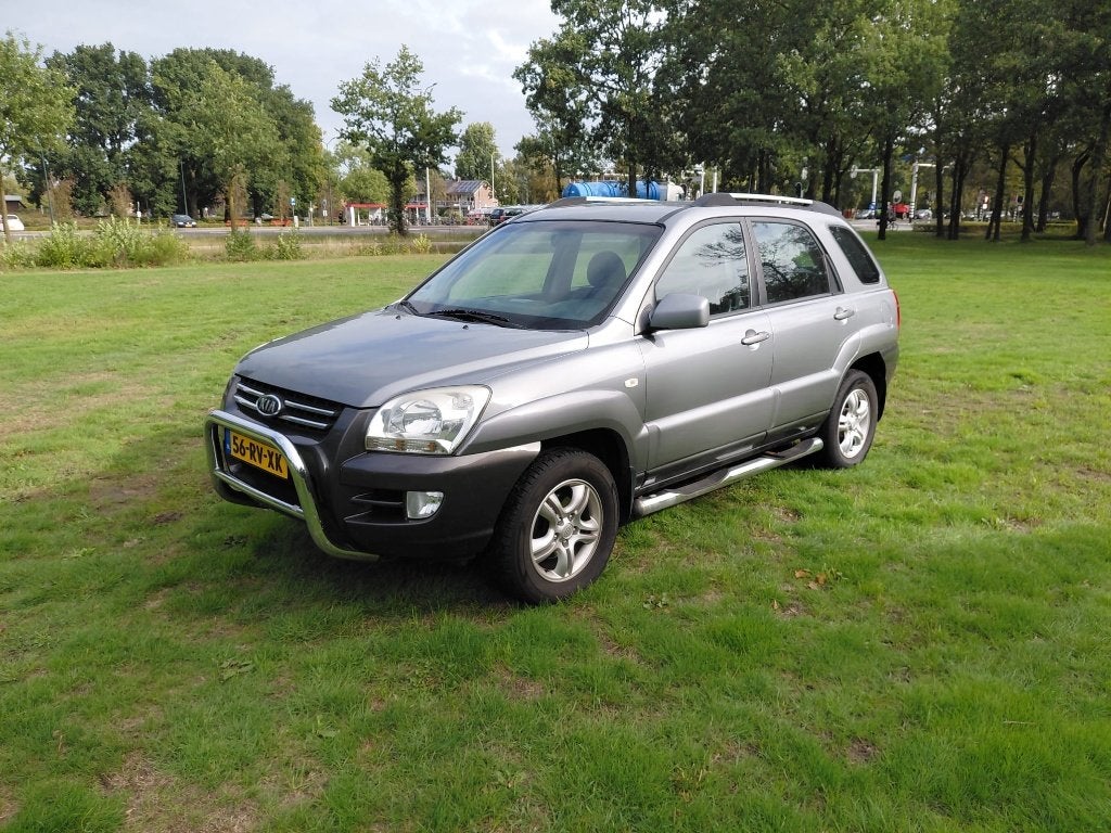 Kia Sportage 2.0 2WD 2005 Grijs, Auto's, 1442 kg, Zwart, 4 cilinders, Overige bekleding