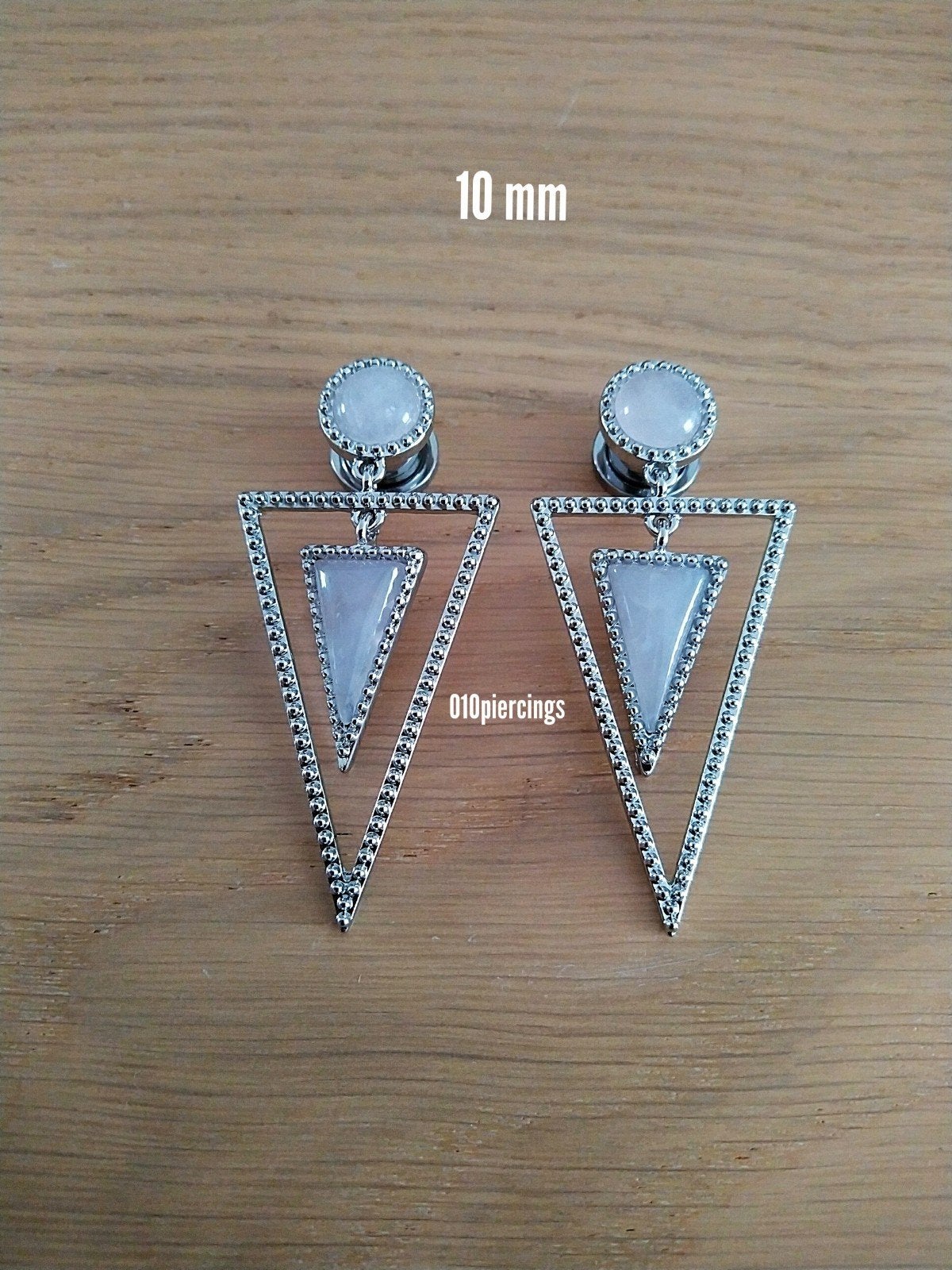 Nieuwe pluggen. Staal. Met hanger. Rozenkwarts. 10 mm., Ophalen of Verzenden, Zo goed als nieuw, Staal, Oor- of Traguspiercing