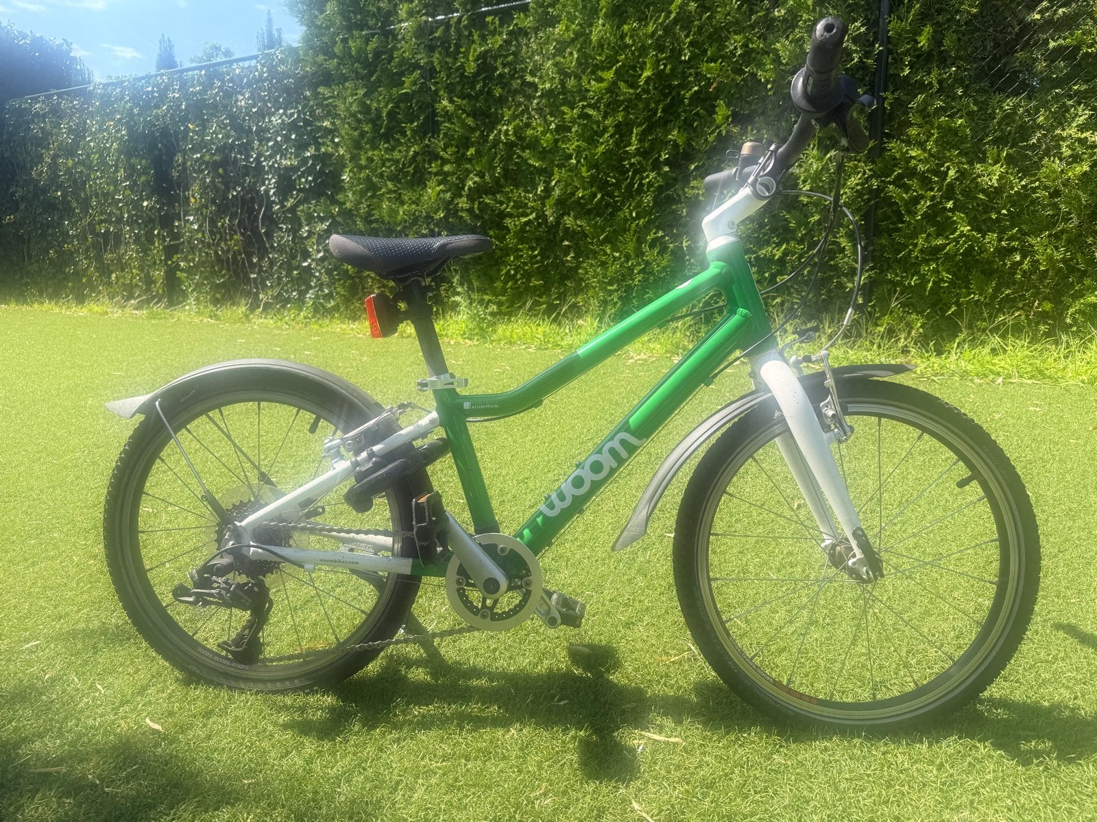 Woom go 4 kinderfiets 20 inch, Ophalen, Zo goed als nieuw, Velgrem, 20 inch of meer