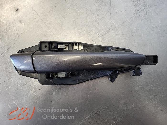Handgreep van een Peugeot Partner