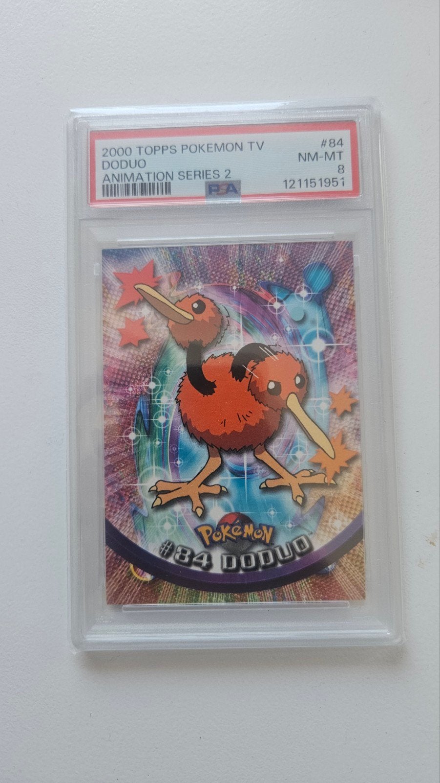 2000 Topps Pokémon TV Doduo #84 PSA 8 NM-MT, Ophalen of Verzenden, Zo goed als nieuw, Losse kaart