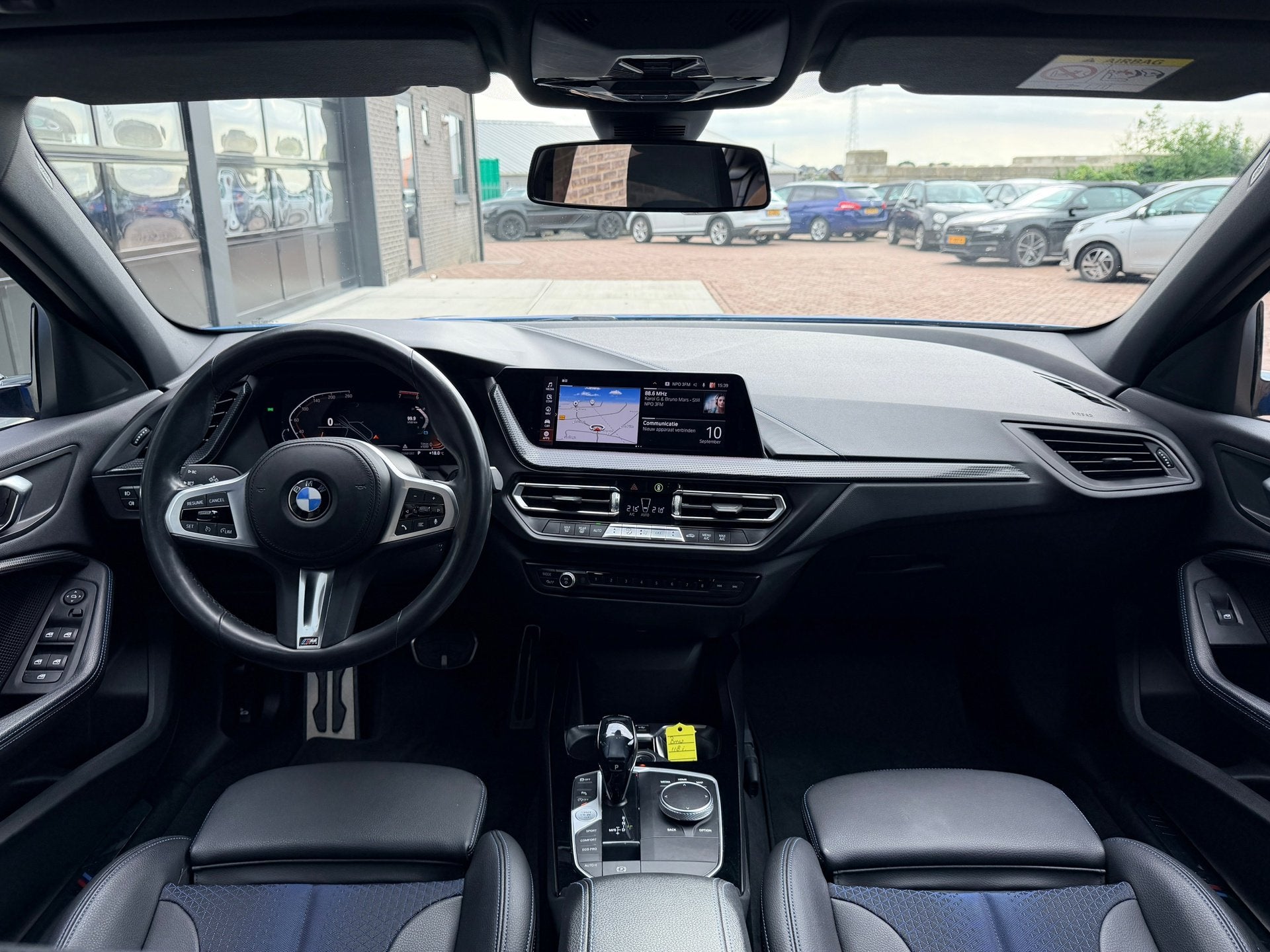BMW 1-serie 118i Executive Edition | M-Pakket | Navi | LED |, Auto's, Gebruikt, Blauw, Leder en Stof, Origineel Nederlands