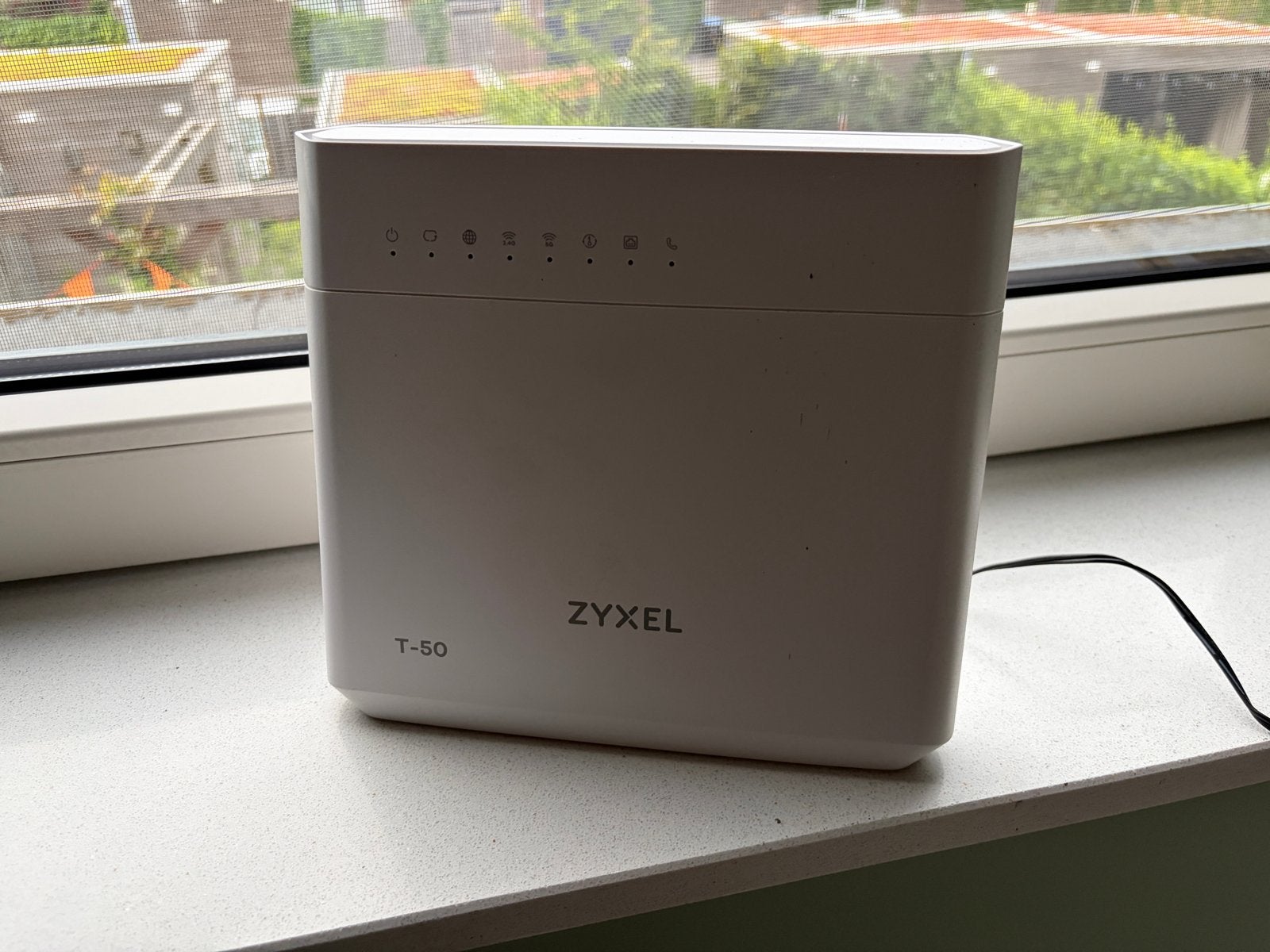 ZyXEL T-50 Modem/Router, Ophalen of Verzenden, Zo goed als nieuw, Router met modem