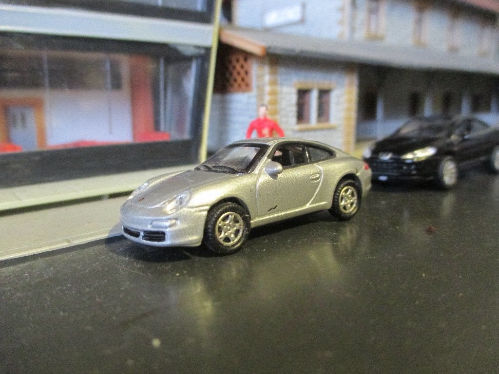 Porsche 997 911 Carrera S Coupe - Welly grijsmetallic, Ophalen of Verzenden, Zo goed als nieuw, Auto, Overige merken