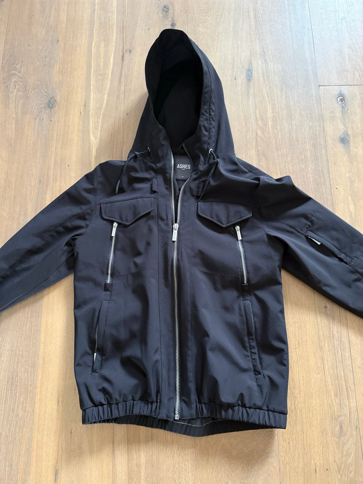 Zwarte tussen jas met capuchon - Maat XL, Ophalen of Verzenden, Zo goed als nieuw, Maat 56/58 (XL), Zwart
