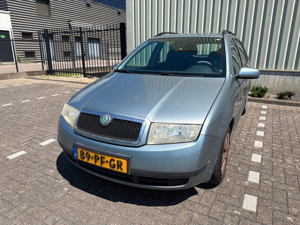 Skoda Fabia Combi 1.4-16V Choice|Airco|Nieuwe APK, Auto's, Skoda, Voorwielaandrijving, Gebruikt, 4 cilinders, Parkeersensor