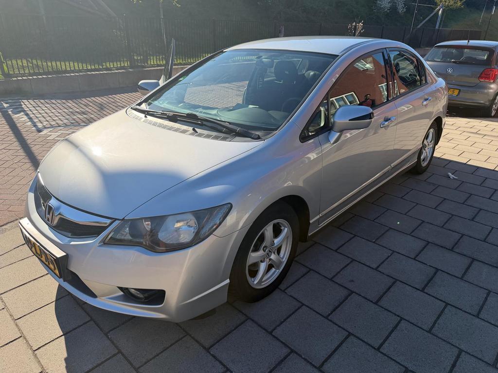 Honda Civic 1.3 95pk Hybride 2010 Grijs Moet weg!!, Auto's, Honda, Zwart, Origineel Nederlands, 22 km/l, Sedan