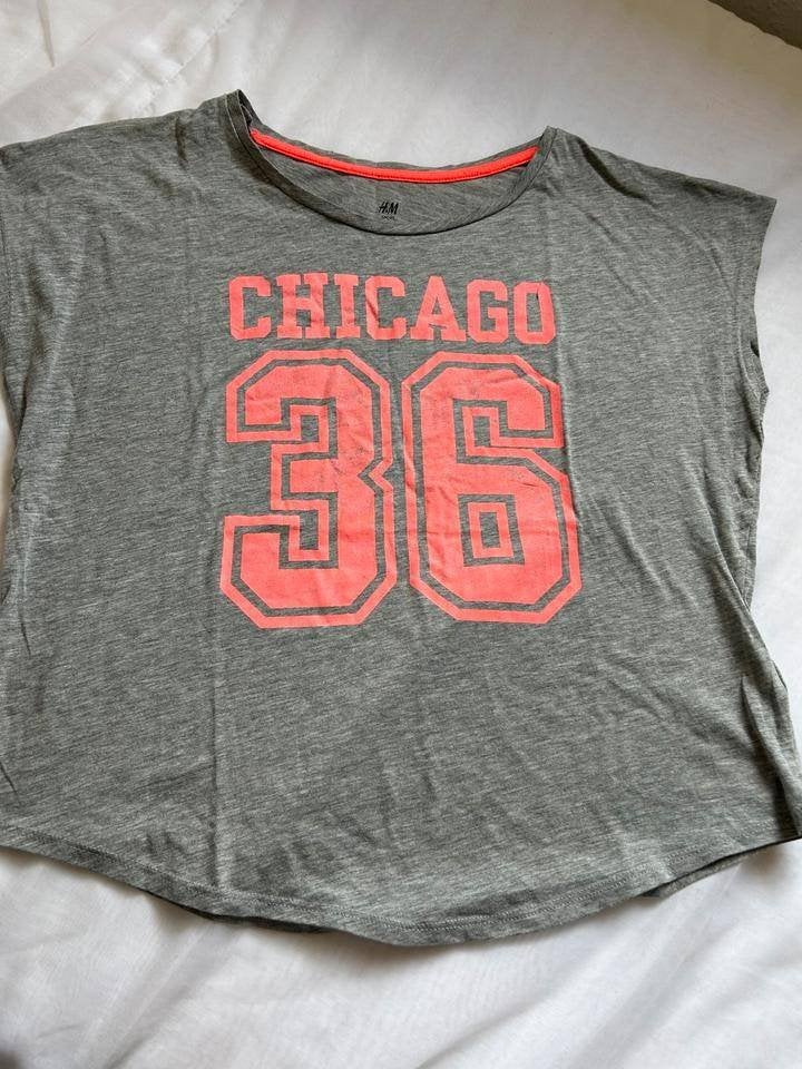 H&M meisjessportshirt T-shirt, Kleding | Heren, T-shirts, Ophalen of Verzenden, Zo goed als nieuw, Maat 48/50 (M), Grijs