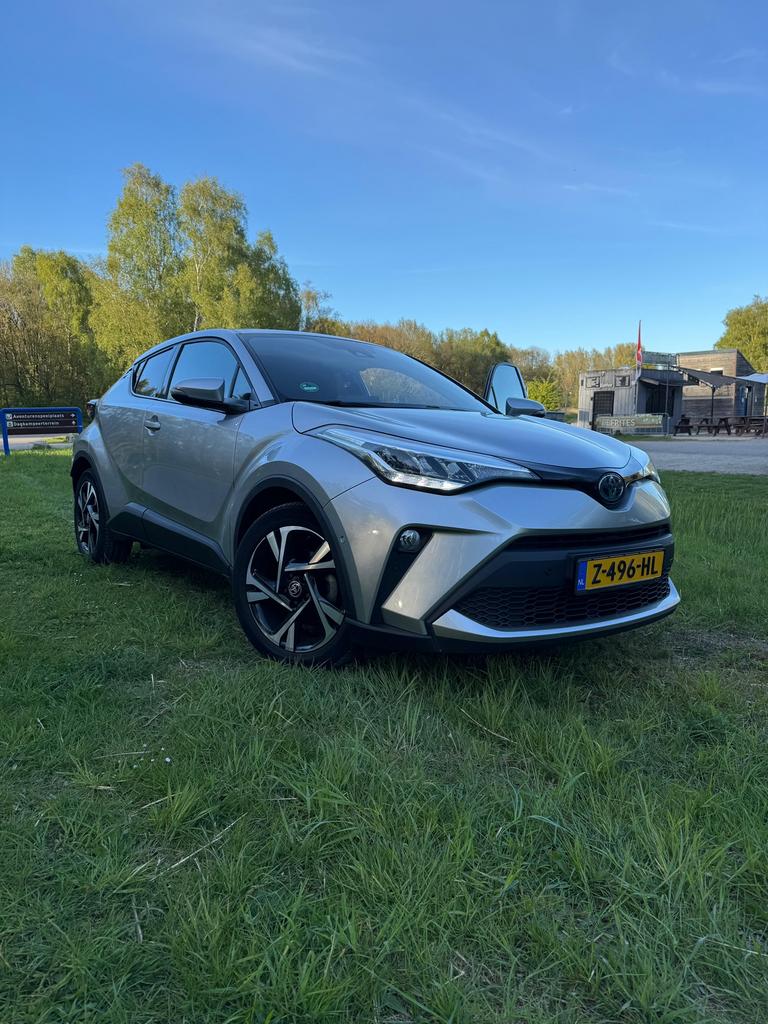 Toyota C-HR 2.0 Hybrid 184pk CVT 2023 Grijs, Auto's, 725 kg, Zwart, 4 cilinders, Leder en Stof
