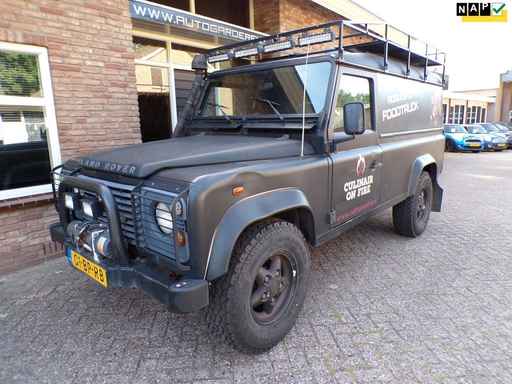 Land Rover Defender 2.5 Td5 HT 110" Robuuste FoodTruck, Auto's, Stof, 2495 cc, Origineel Nederlands, Bedrijf