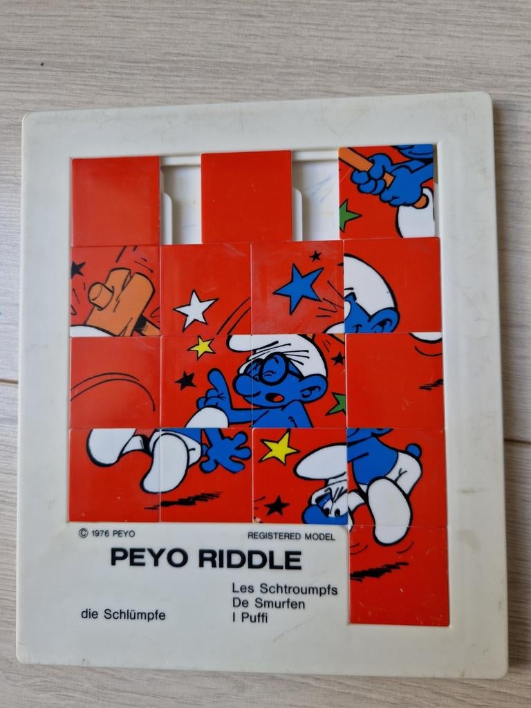 1976 de smurfen schuifpuzzel peyo riddle puzzel puzzle, Verzamelen, Ophalen of Verzenden, Verschillende Smurfen