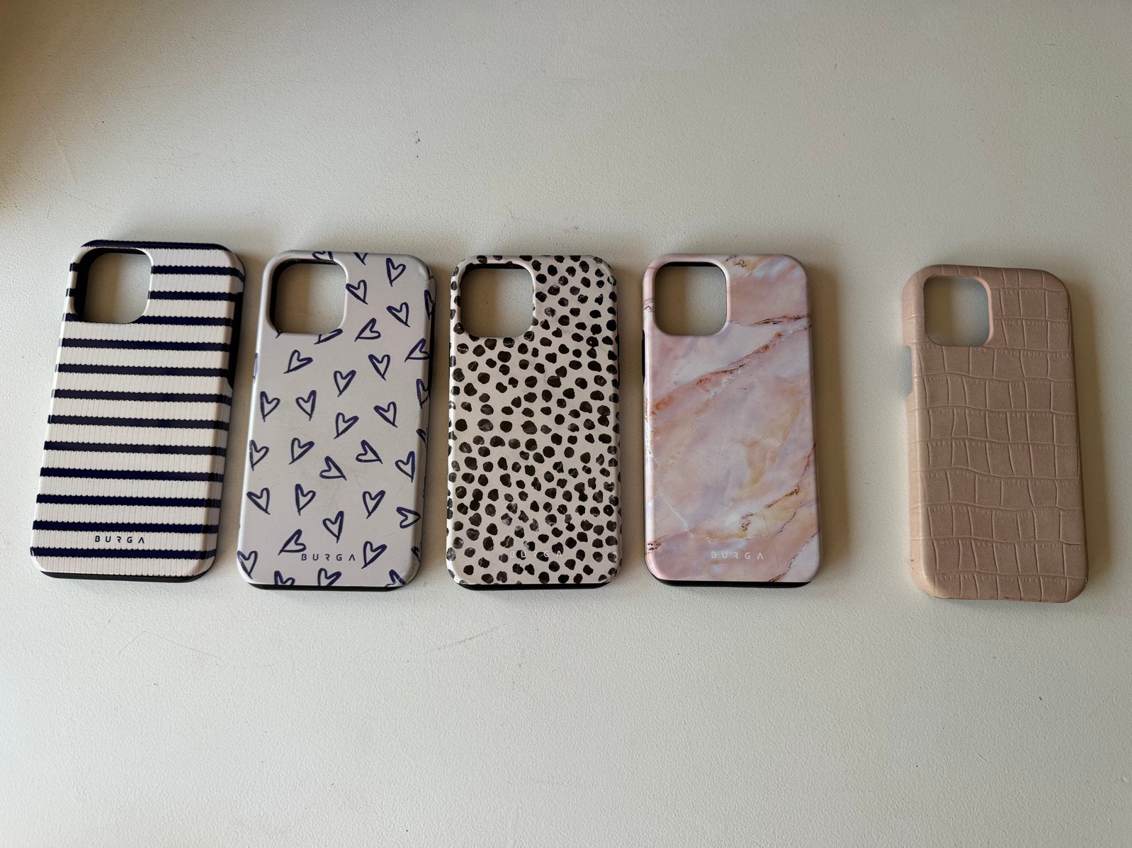 4x iPhone 12 Pro hoesjes (3x BURGA, 1x normaal), Kunststof, Gebruikt, Hoesje of Tasje, Ophalen of Verzenden