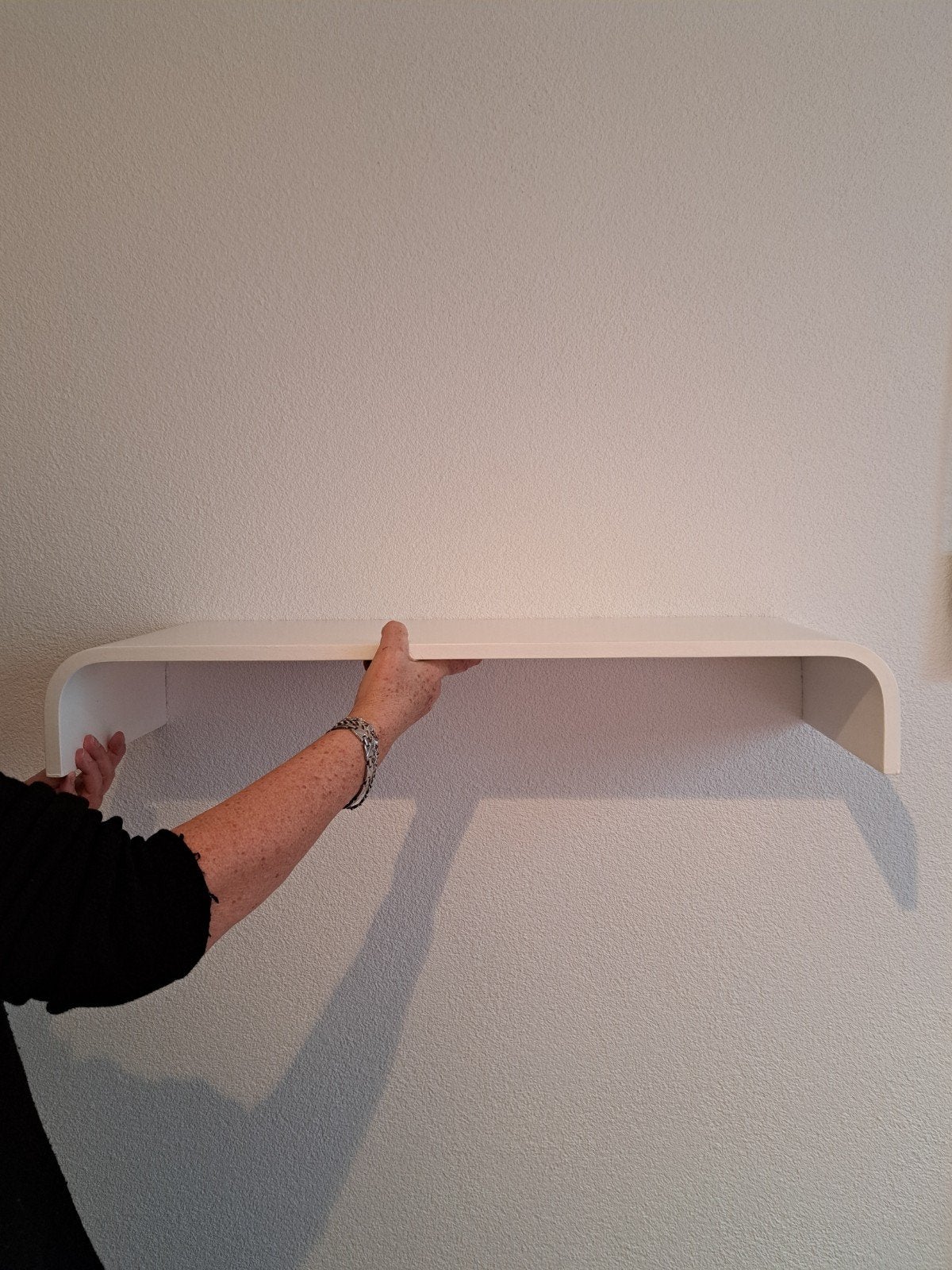Wandplank van trendhopper, Ophalen