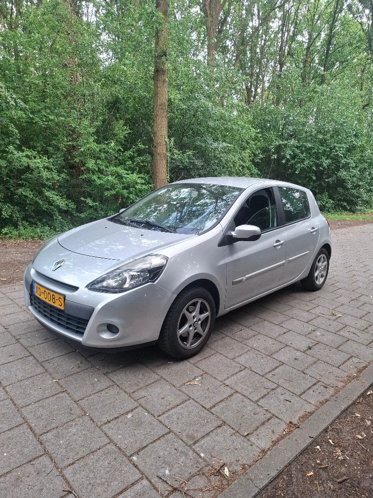 Renault Clio 1.2 16V 55KW 5-DRS E4 2012 Grijs, Voorwielaandrijving, 74 pk, 4 cilinders, Metallic lak