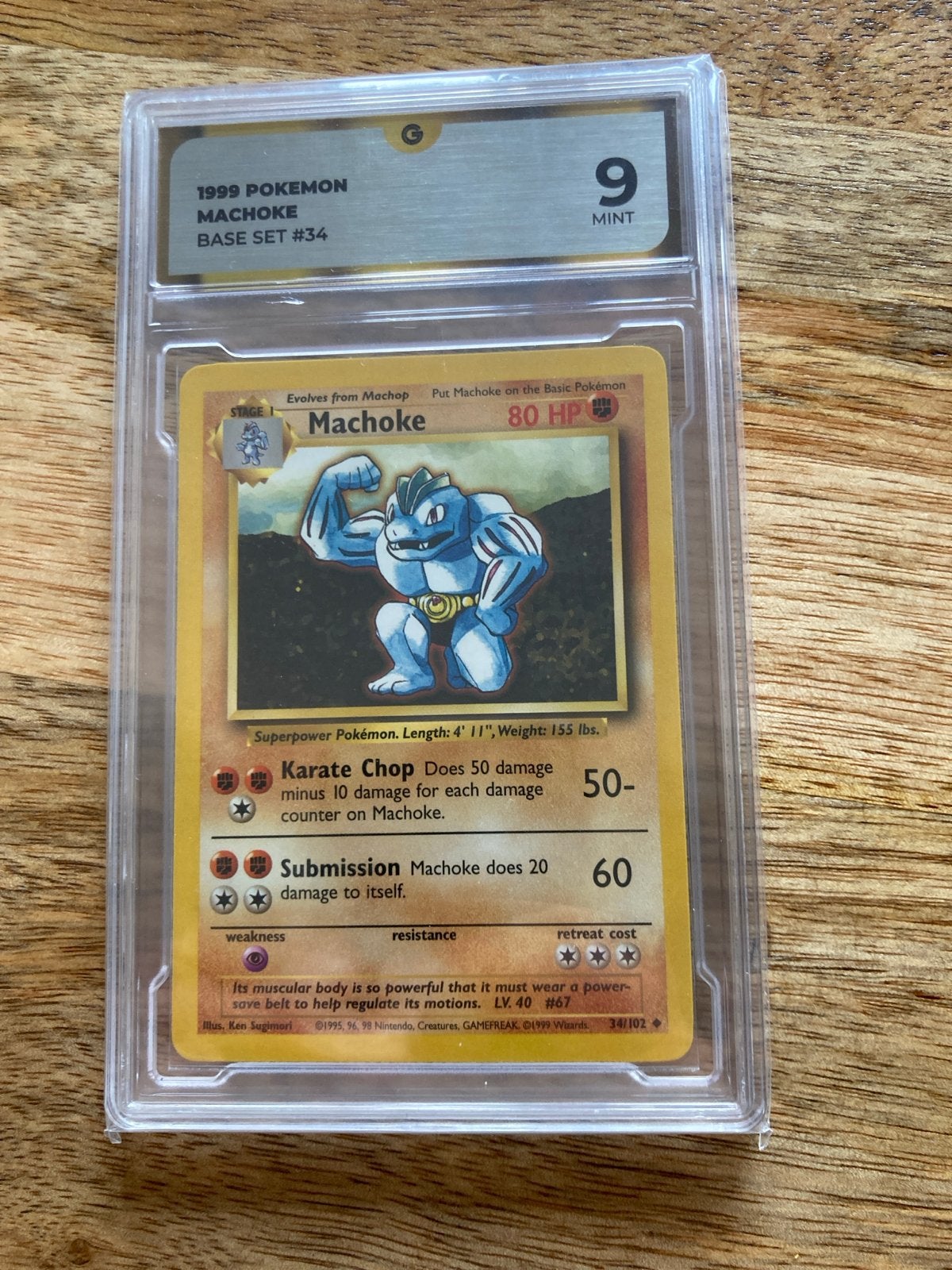 1999 Pokémon Machoke Base Set #34 - PSA 9 Mint, Ophalen of Verzenden, Zo goed als nieuw, Losse kaart