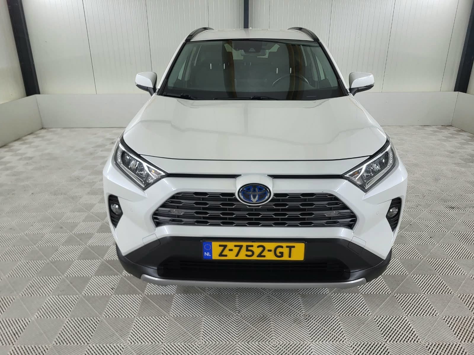 Toyota RAV4 2.5 Hybrid Comfort, Camera, Parelmoer kleur, Auto's, Dealer onderhouden, Stof, Gebruikt, 4 cilinders