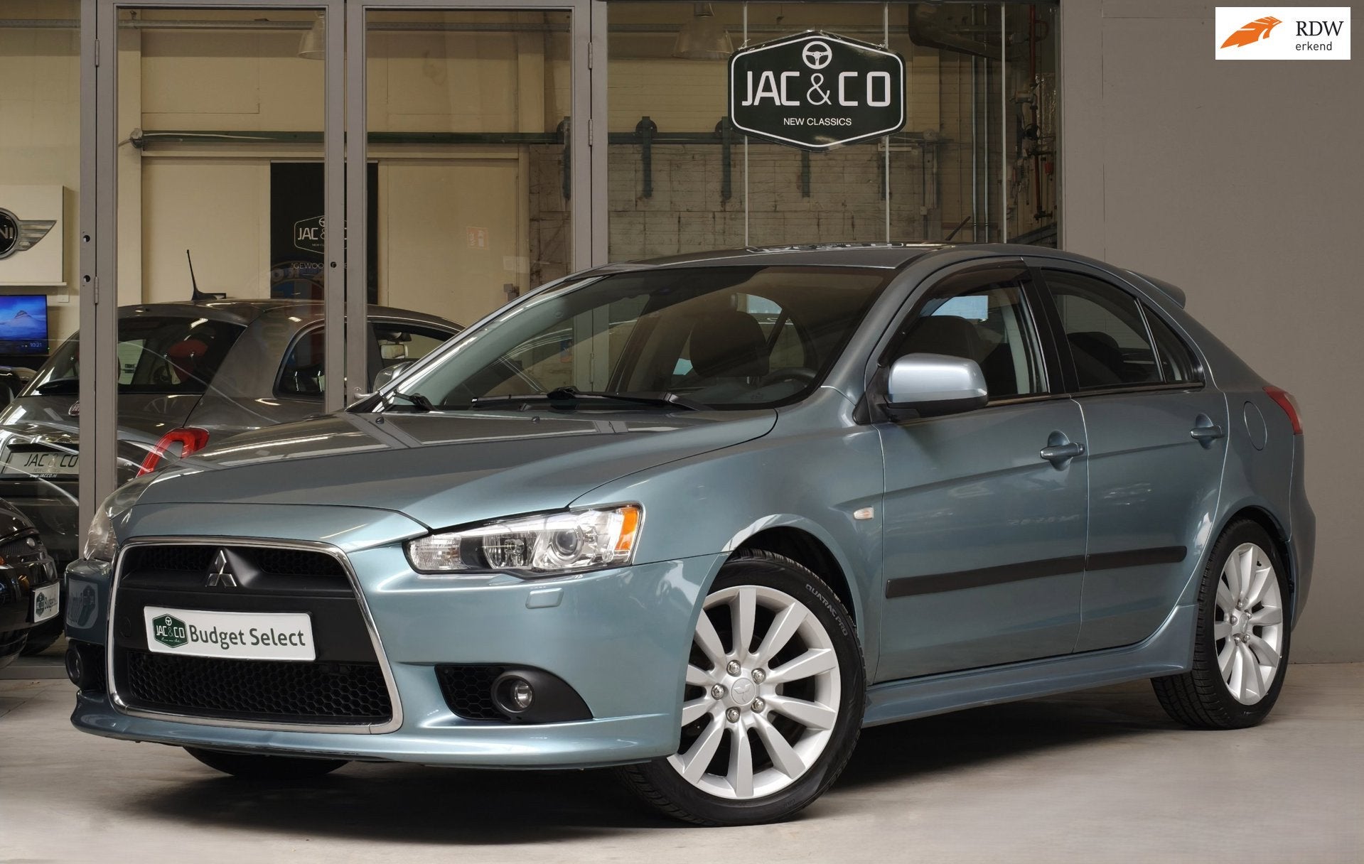 Mitsubishi Lancer Sportback 1.8 Instyle Automaat 100% onderh, Gebruikt, Zwart, Blauw, Leder