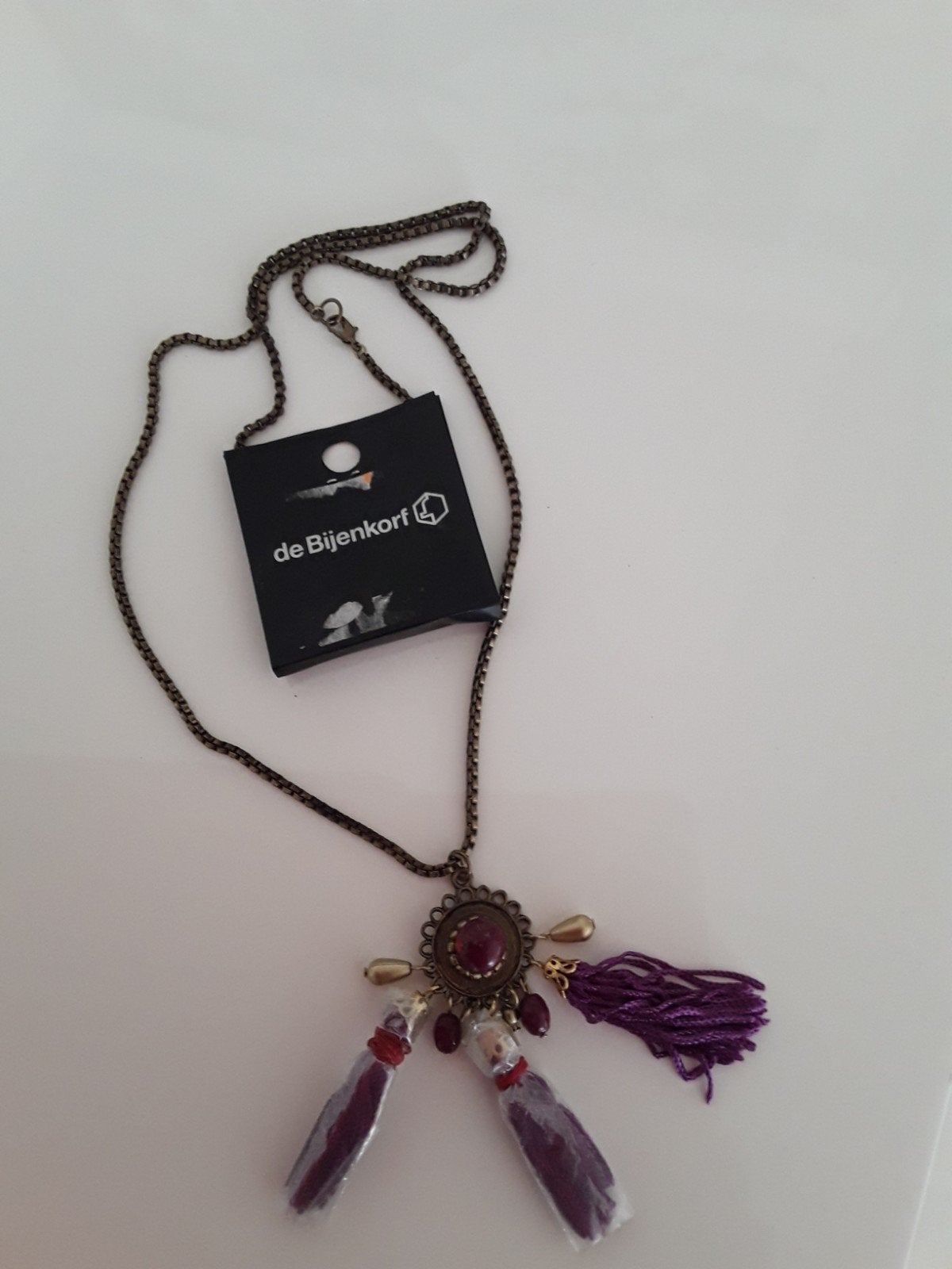 Ketting met paarse kwastjes en hanger - De Bijenkorf, Paars, Nieuw, Ophalen of Verzenden, Overige materialen