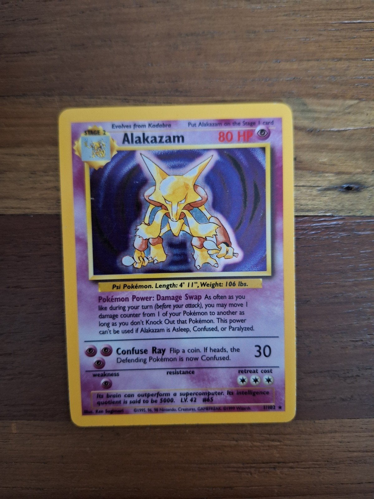 Alalazam base set engels 1/102 - vintage pokemon, Hobby en Vrije tijd, Verzamelkaartspellen | Pokémon, Ophalen of Verzenden, Zo goed als nieuw