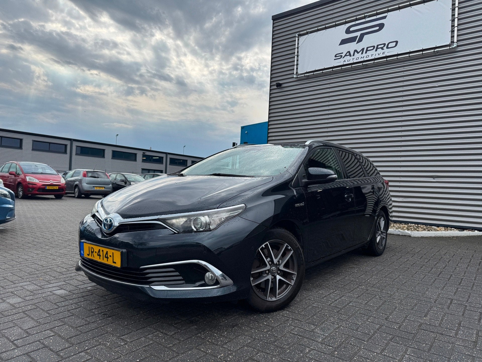 Toyota Auris Touring Sports 1.8 Hybrid Executive, 28 km/l, Gebruikt, Euro 6, Leder en Stof