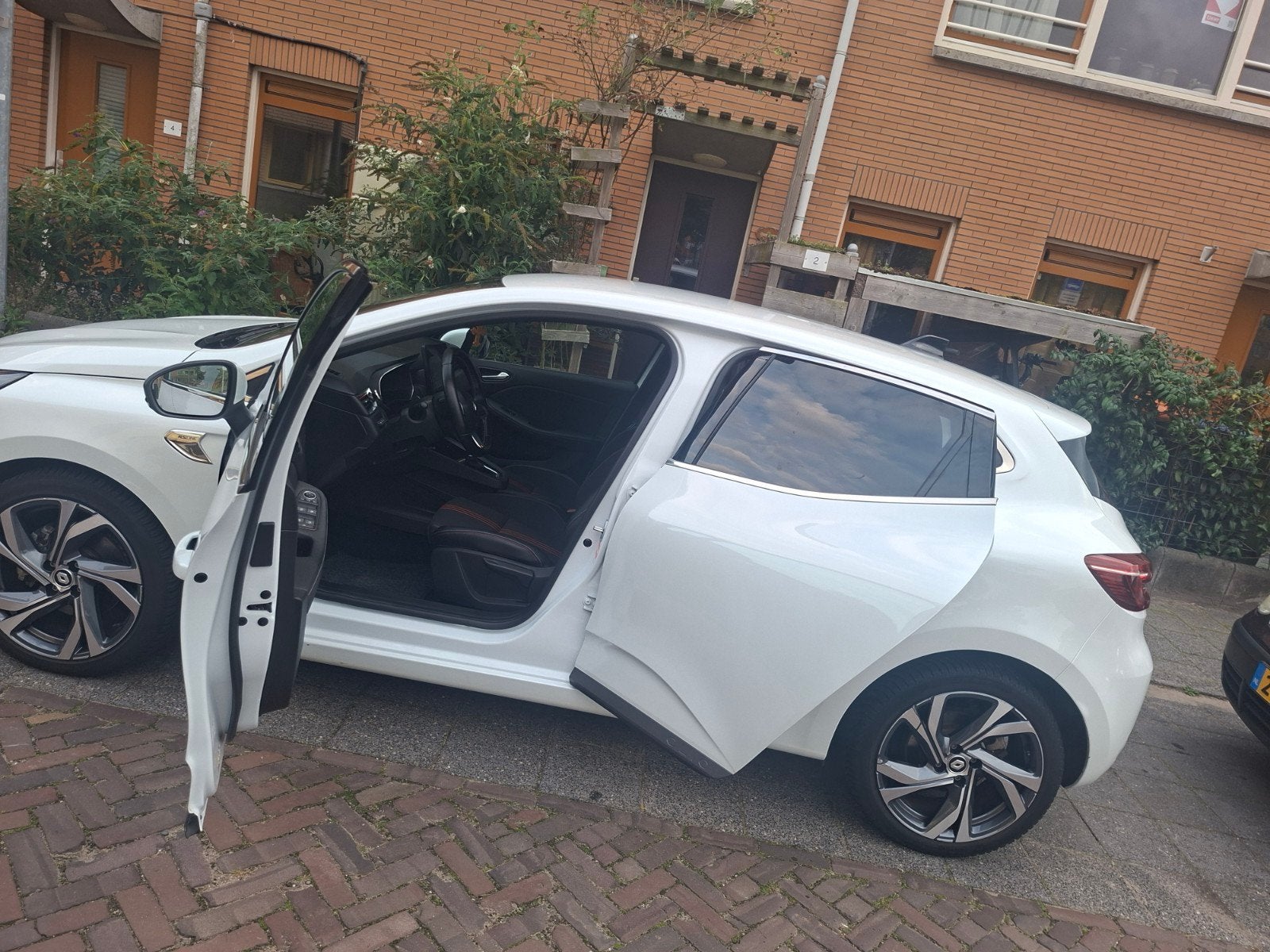 Renault Clio 1.6 E-tech Hybrid 140pk 2022 Wit, Auto's, Wit, 91 pk, 22 km/l, 900 kg