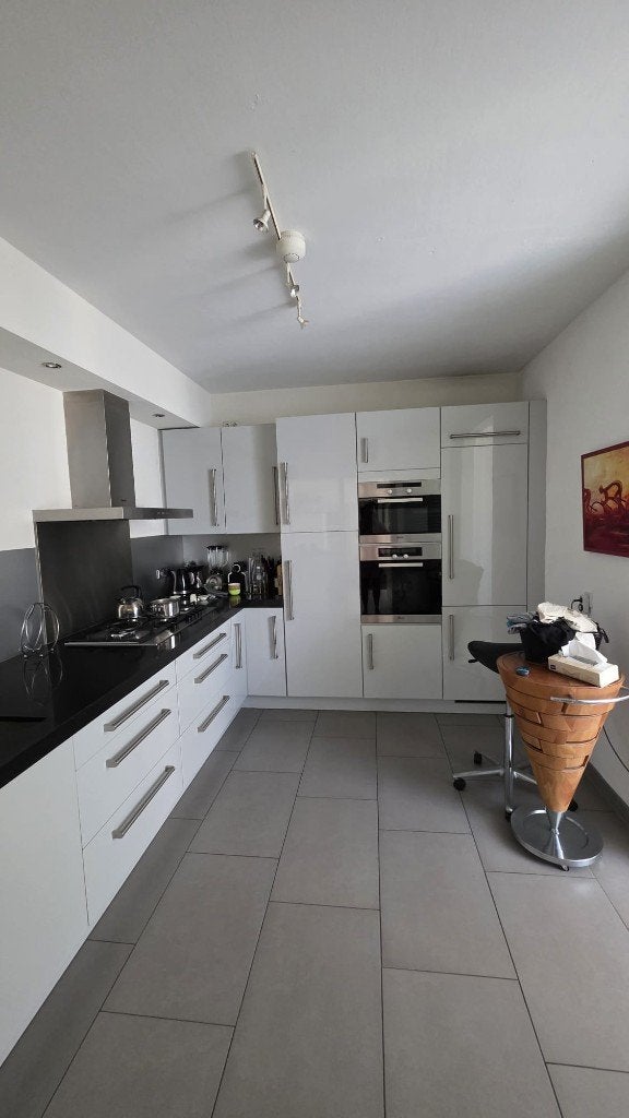 Luxe Grijze Hoogglans Hoekkeuken incl. Miele GEDEMONTEERD