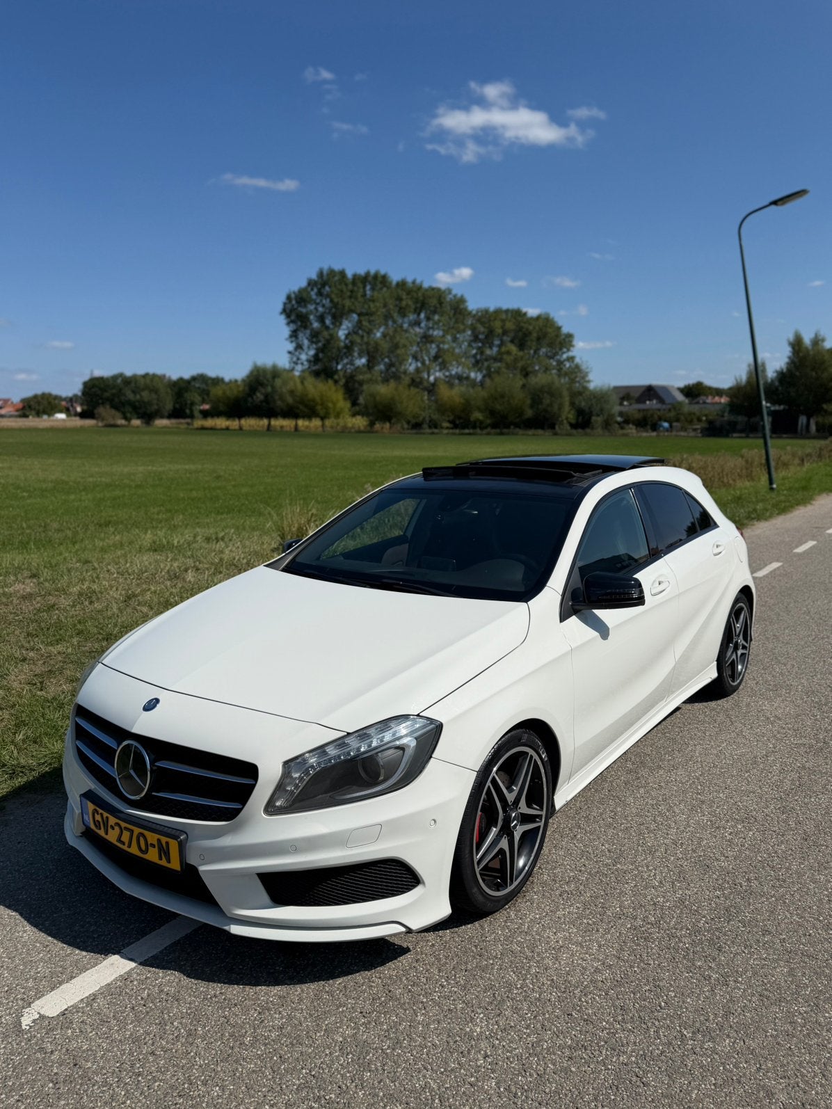 Mercedes-Benz A180 AMG Blue EFF AUTOMAAT PANORAMA, Auto's, Automaat, Achterwielaandrijving, 4 cilinders, 19 km/l